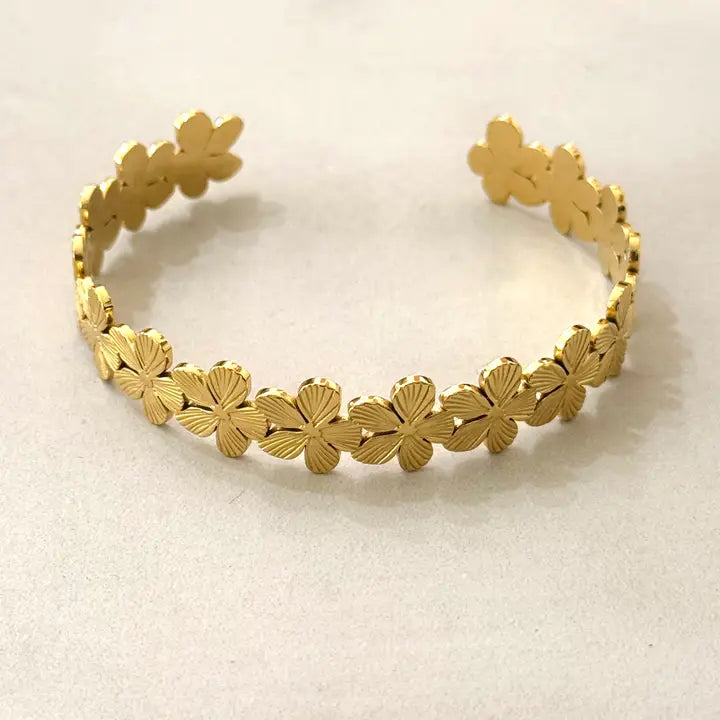 Florales Armreifen aus Edelstahl mit 14k Goldbeschichtung
